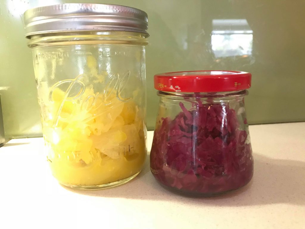 Jars of Fermented Pineapple and Saurkraut